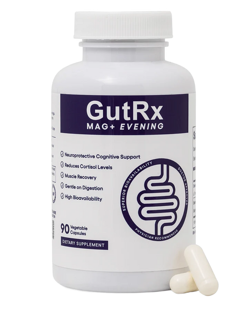 A white plastic bottle of GutRx MAG+ EVENING dietary supplement with a white cap, shown on a white background with two capsules in front.